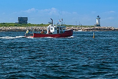 Lobsterboat by Straitsmouth Island Light